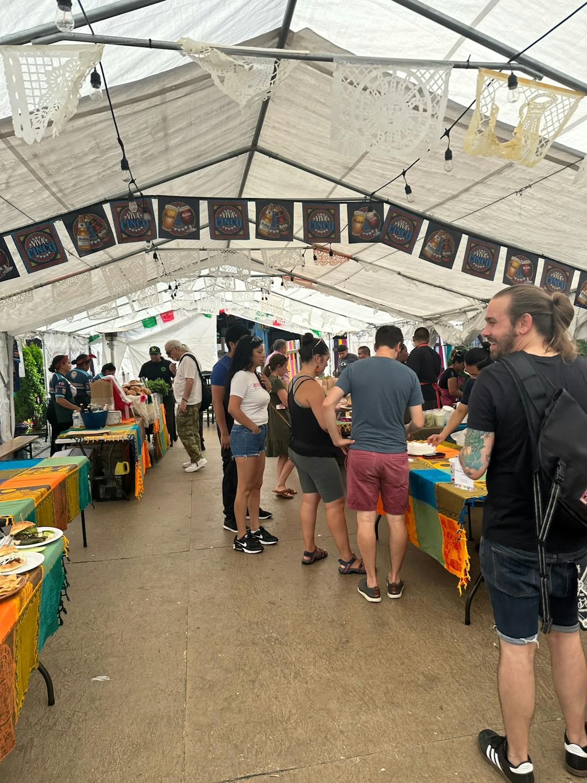 a group of people standing in front of a crowd