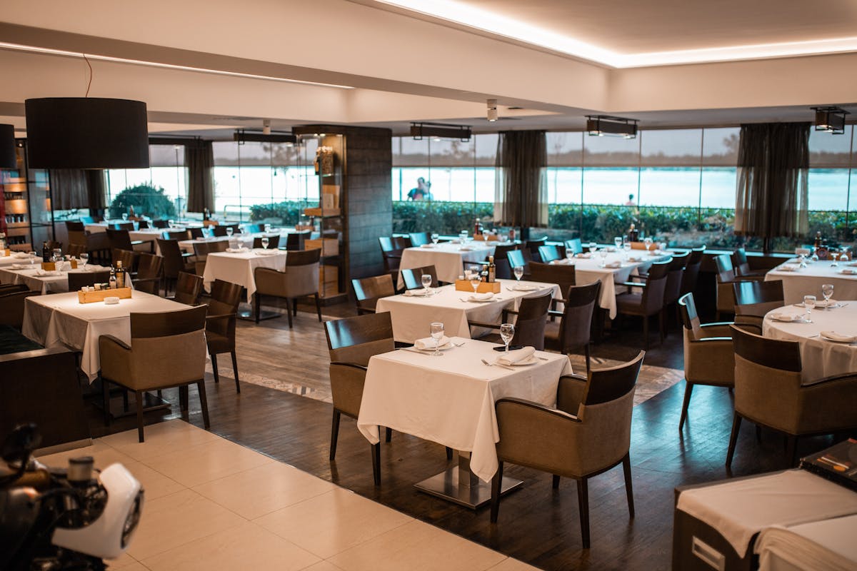 a room filled with furniture and a large window