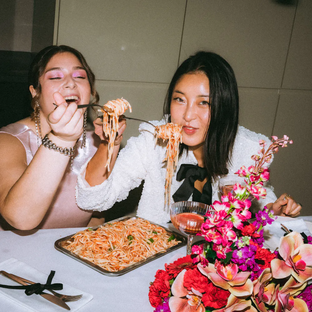 a group of people that are eating some food