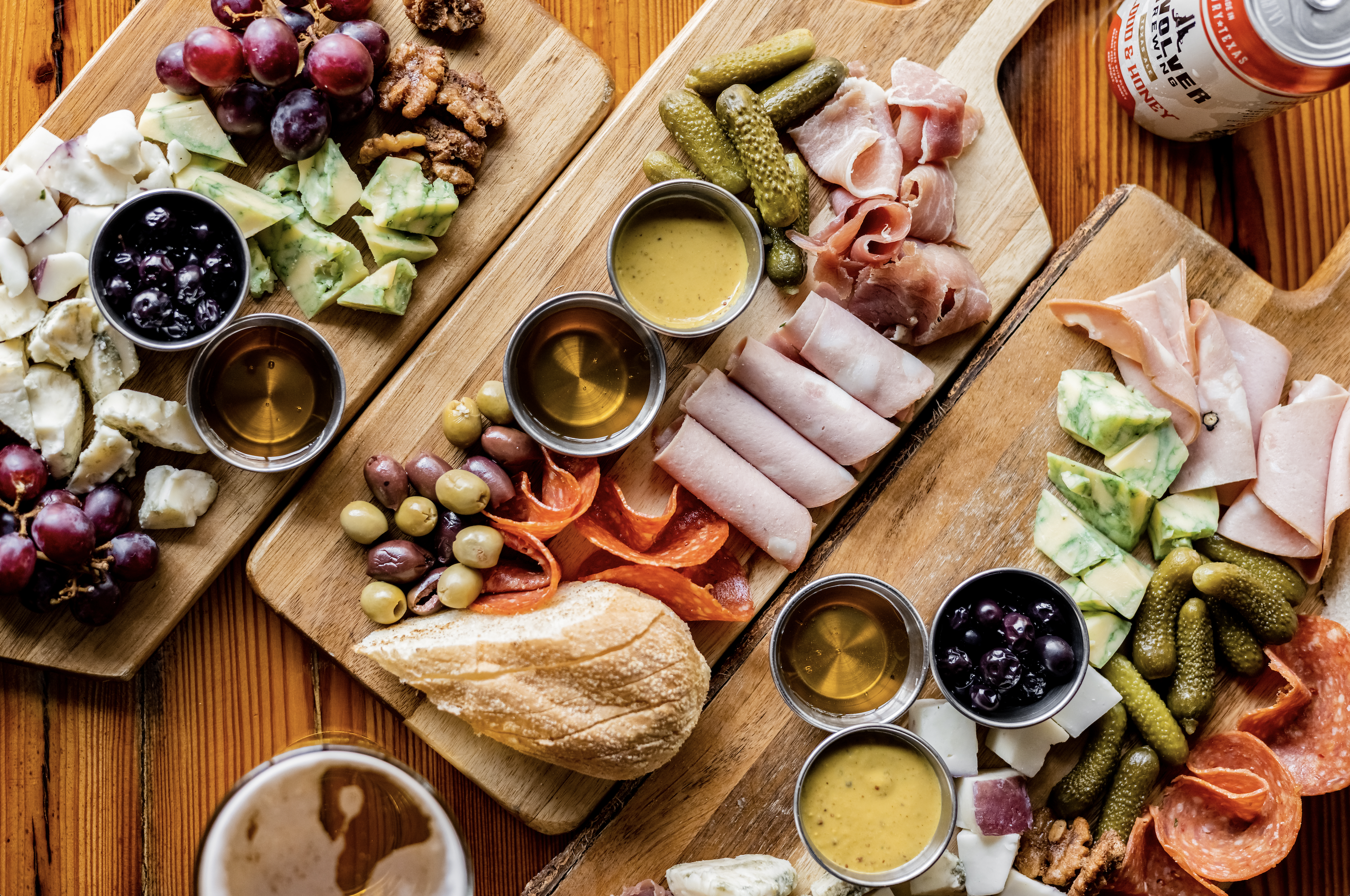 a bunch of food sitting on top of a wooden table