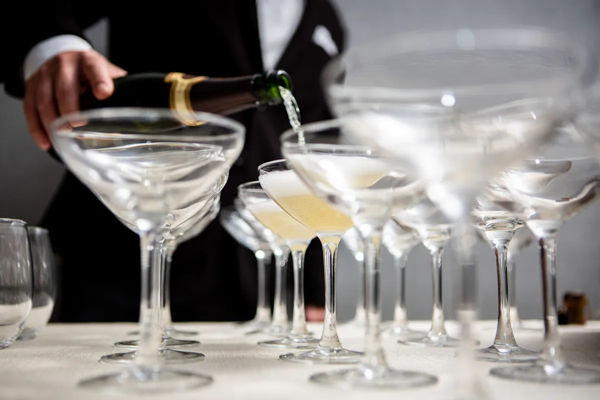 a table filled with wine glasses