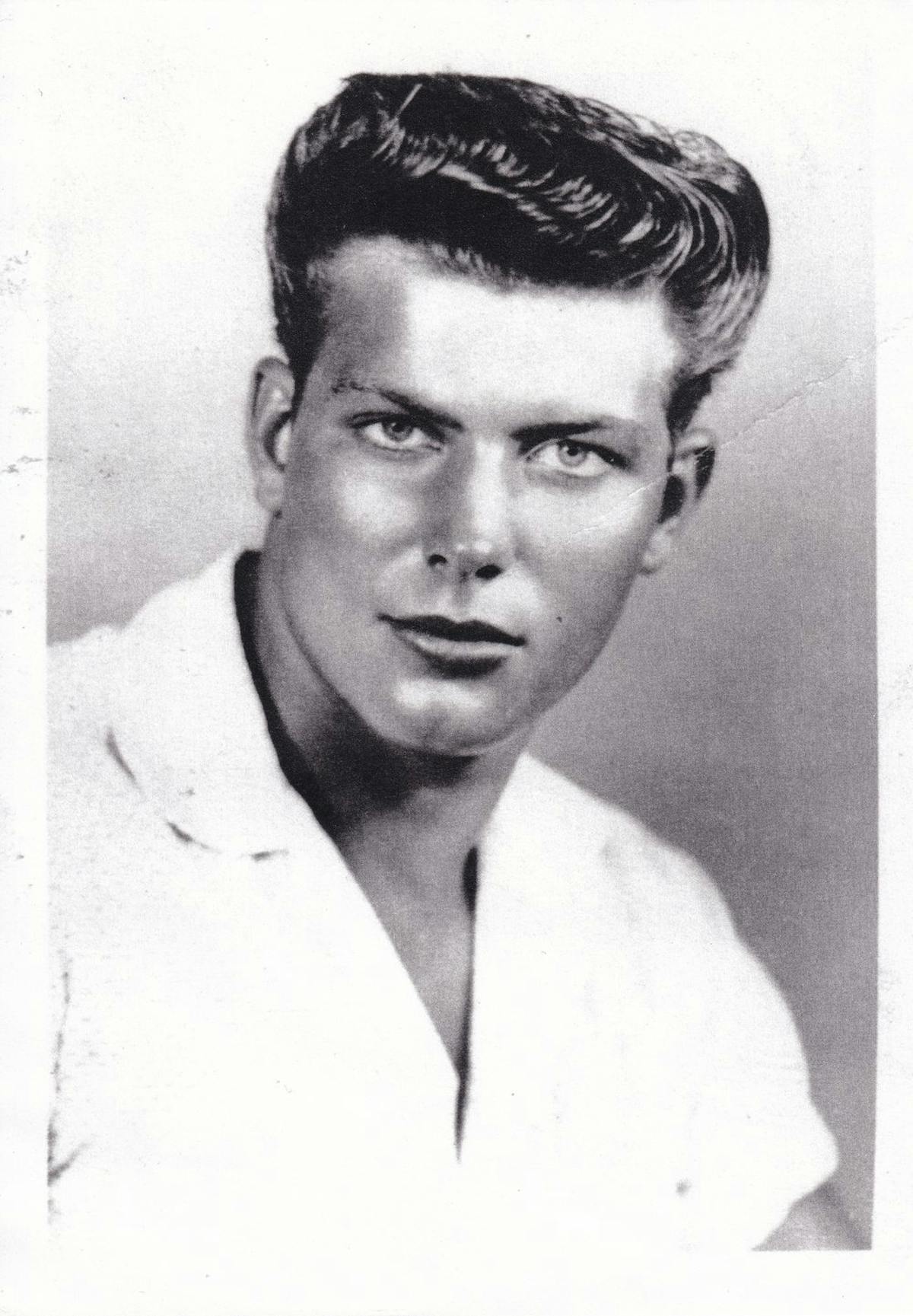 a man posing for a photo