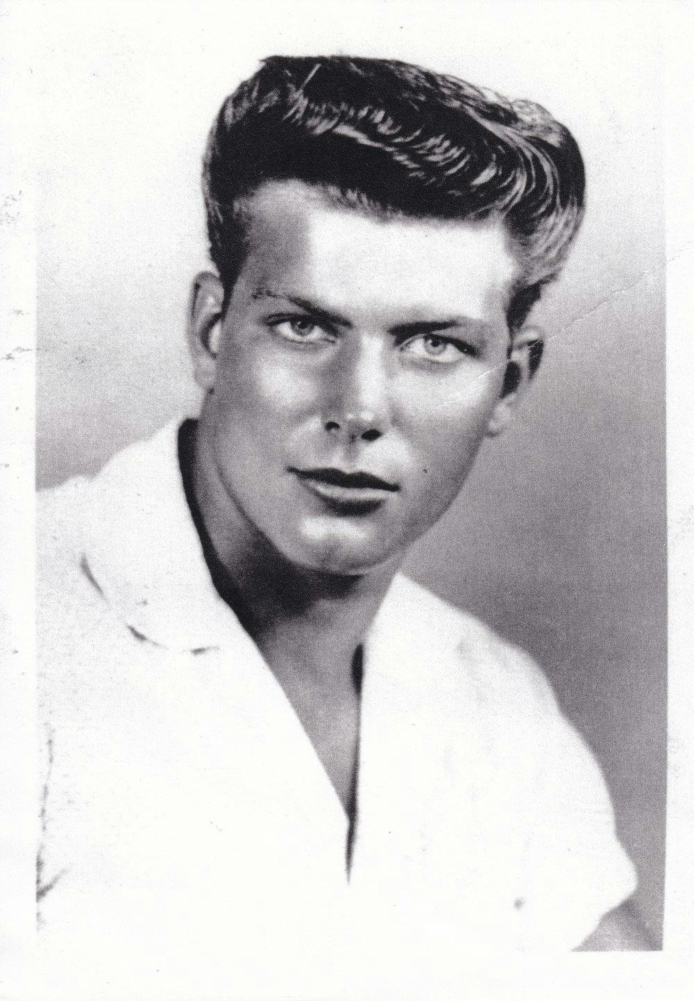 a man posing for a photo