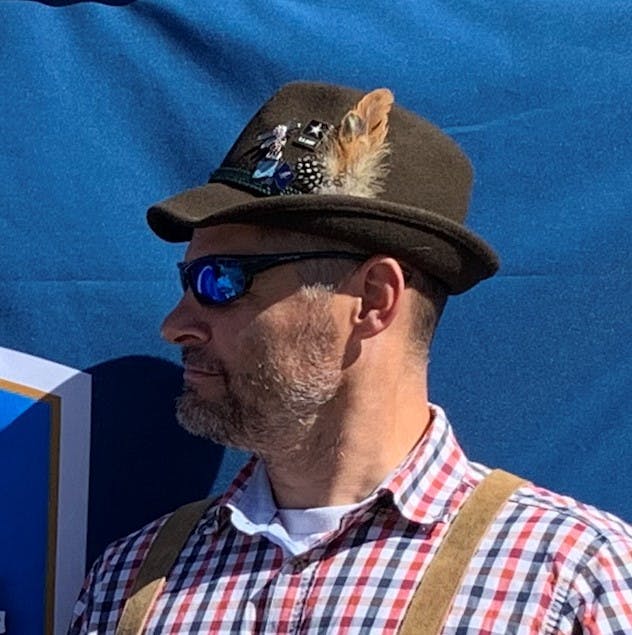a man wearing sunglasses and a hat