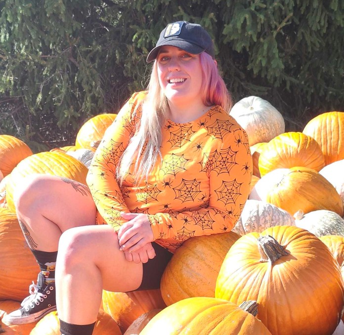a woman sitting on a bench