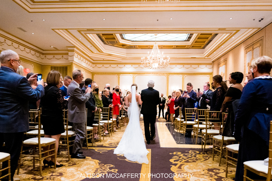a group of people standing in a room
