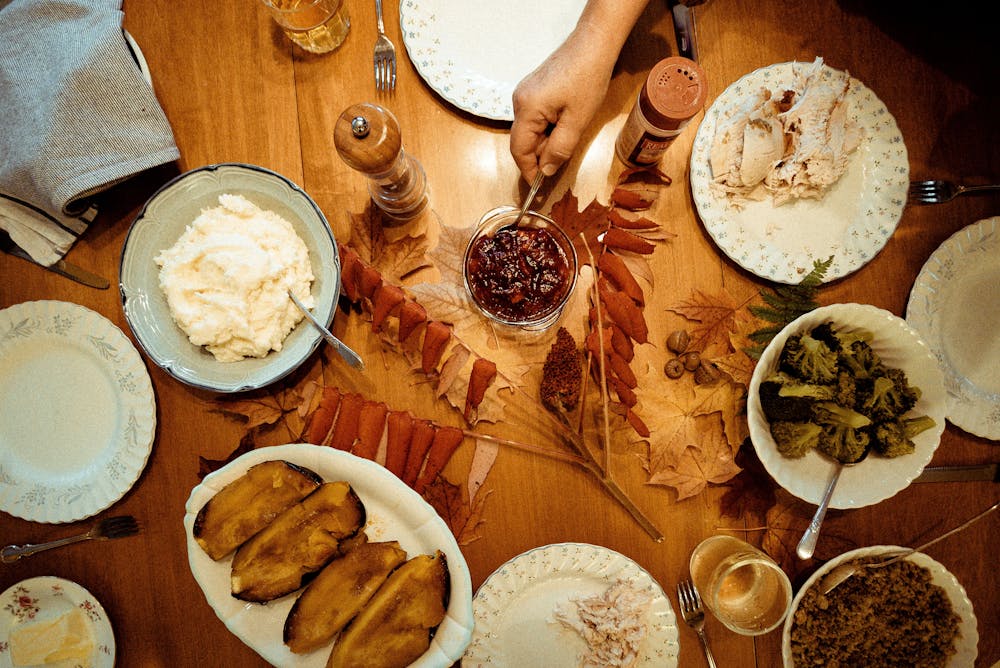 a table topped with plates of food on a plate