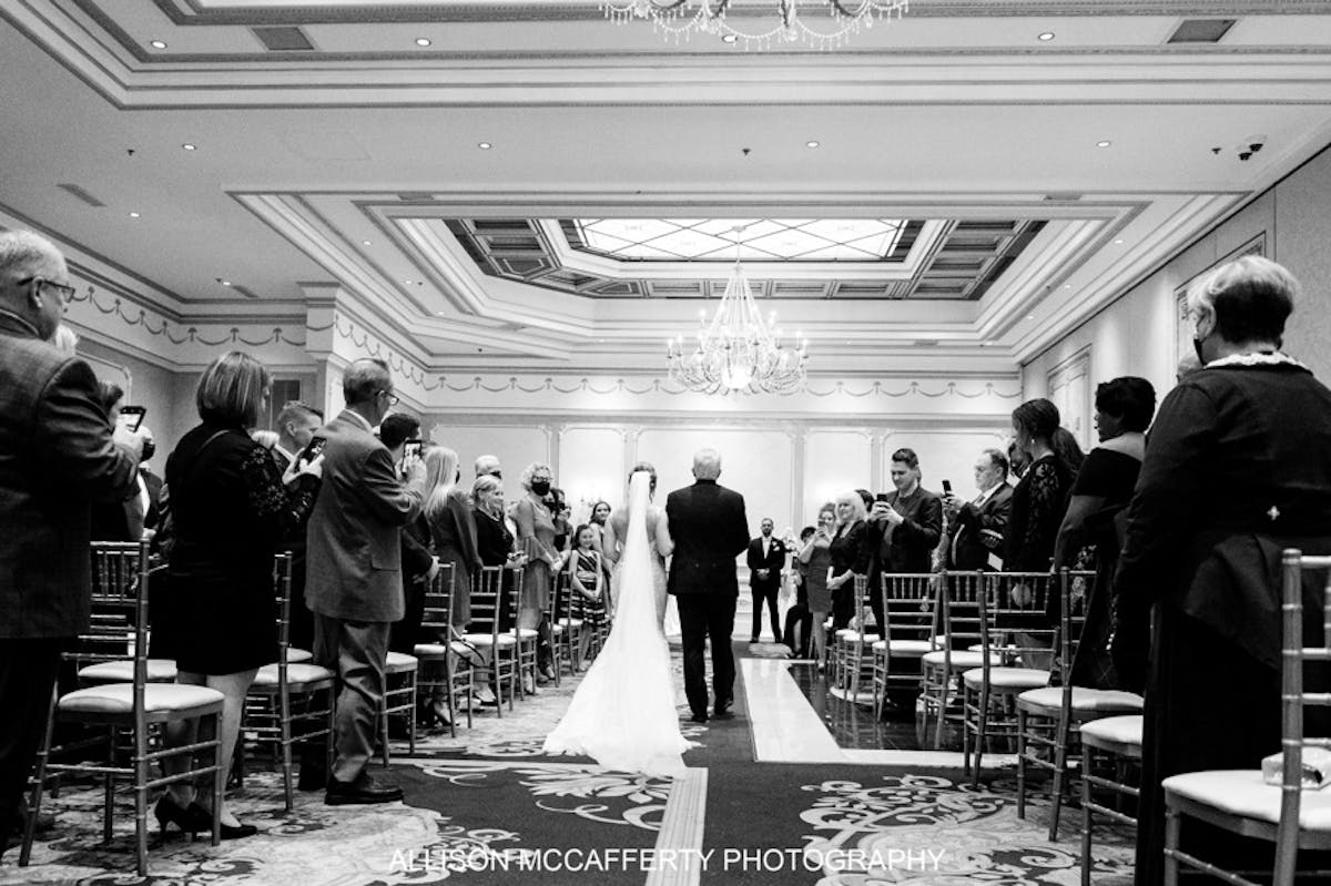 a group of people standing in a room