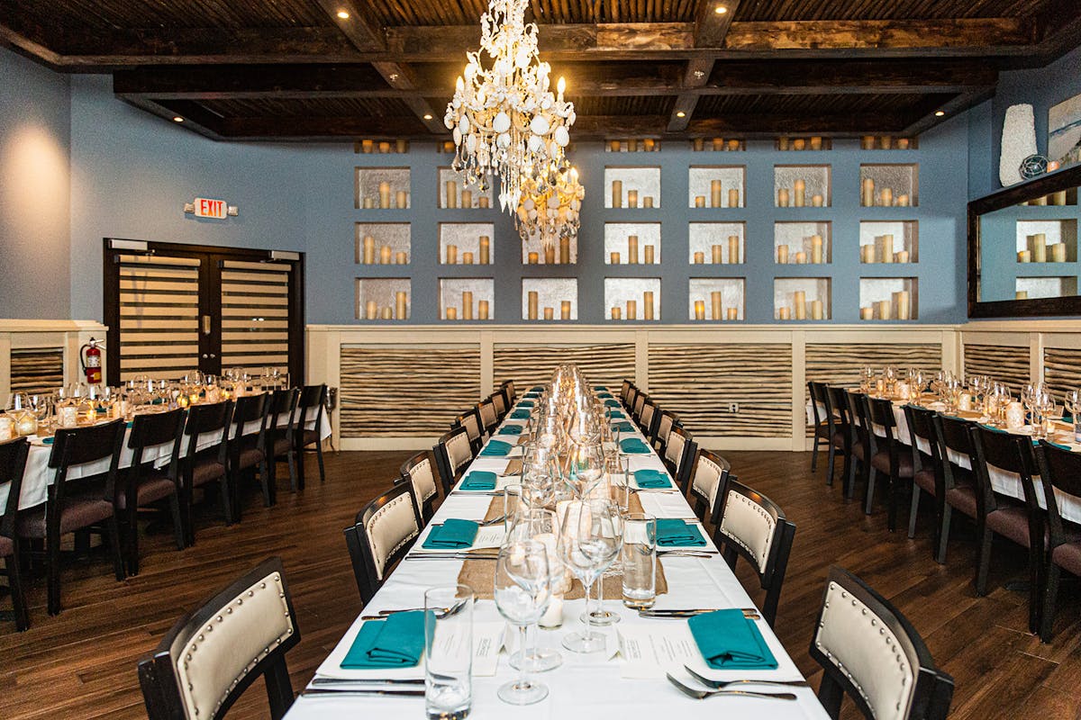 a dining room table in front of a building