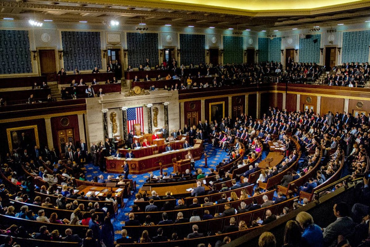 a crowd of people in a room