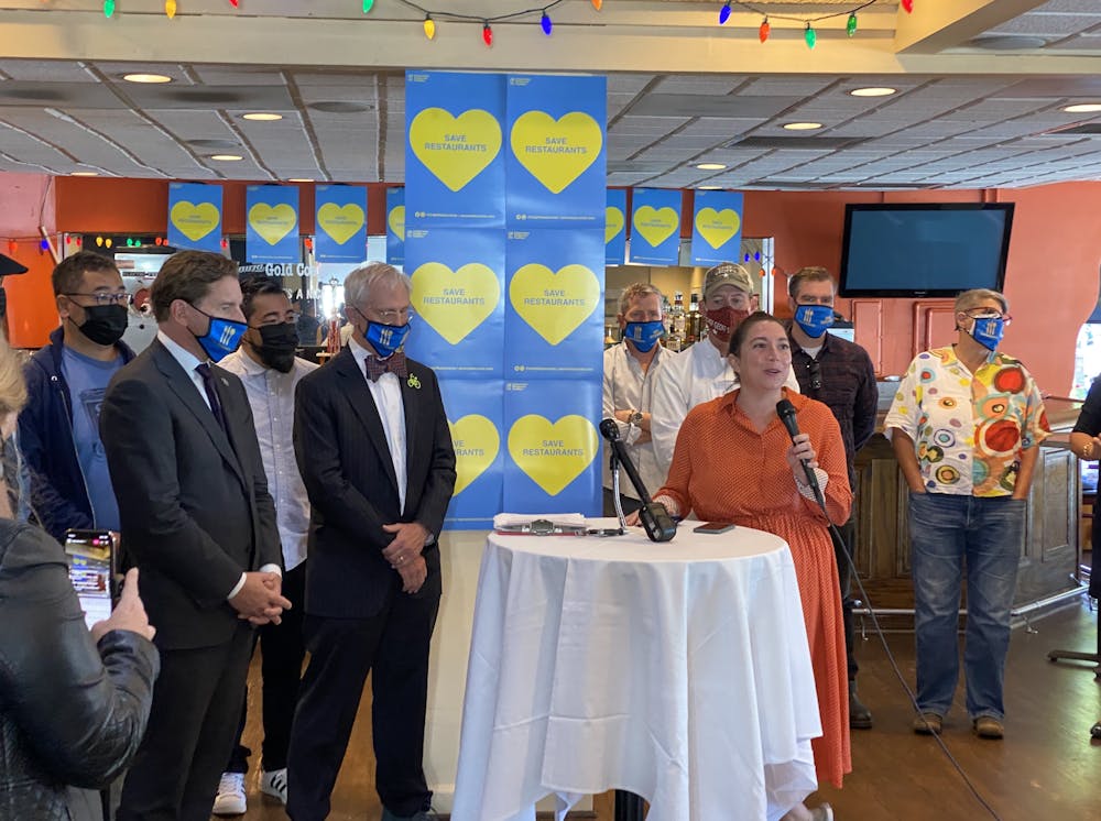 a group of people standing in a room