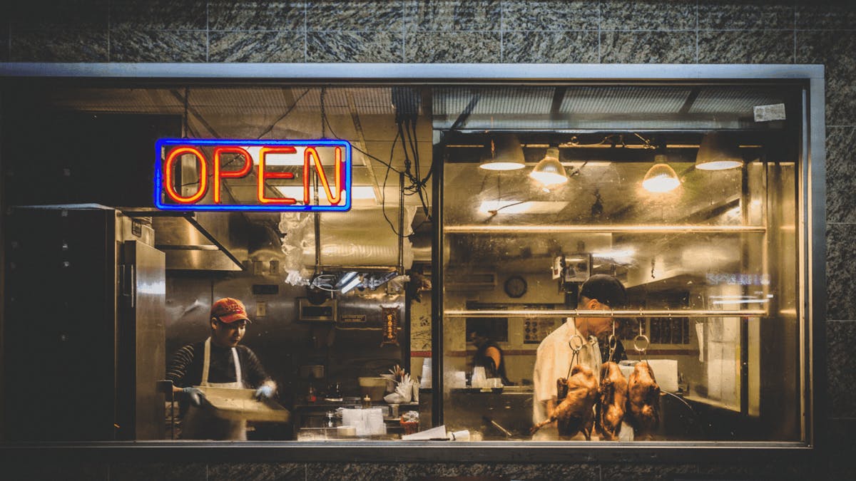 a person standing in front of an oven