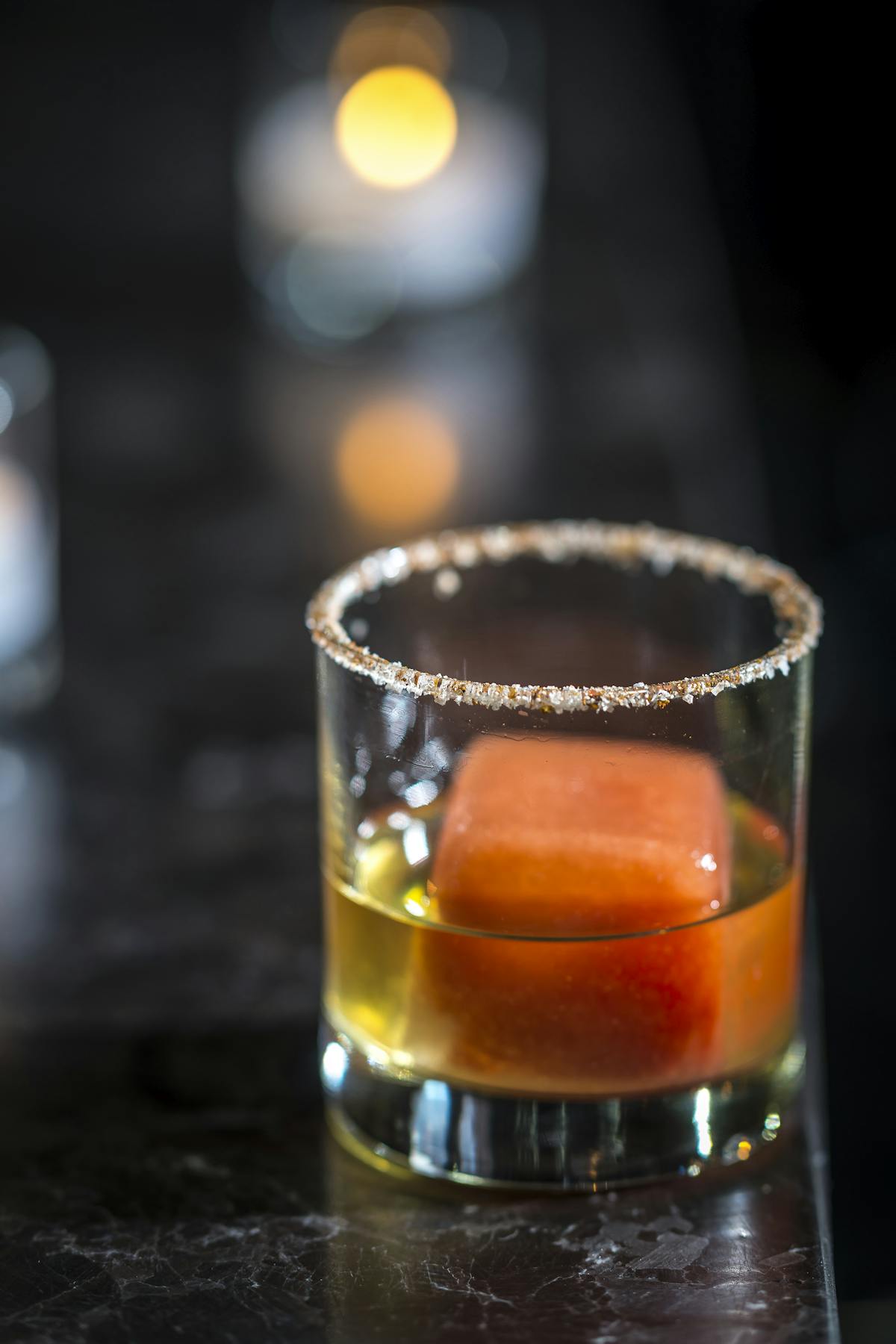 a close up of a glass cup on a table