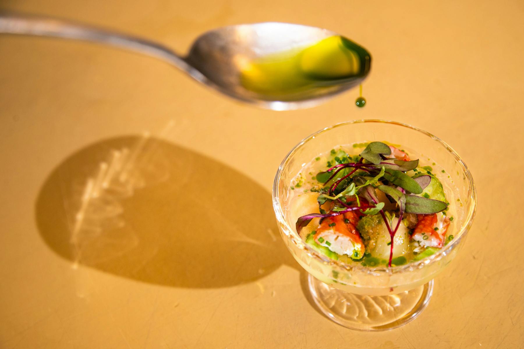 a bowl of food on a plate on a table