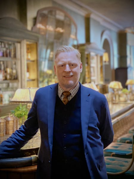 a man in a blue suit