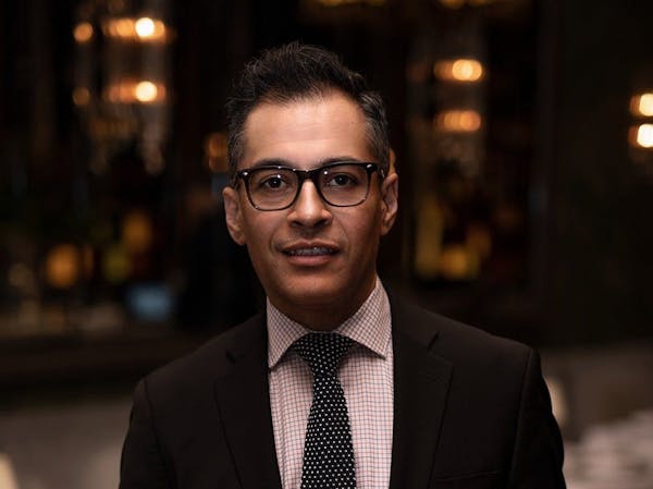 a man wearing a suit and tie