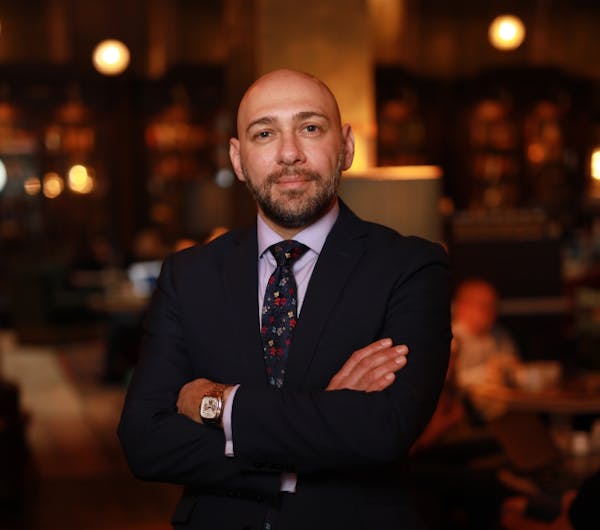 a man wearing a suit and tie