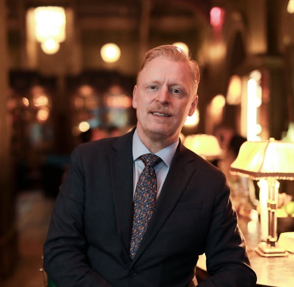 a man wearing a suit and tie