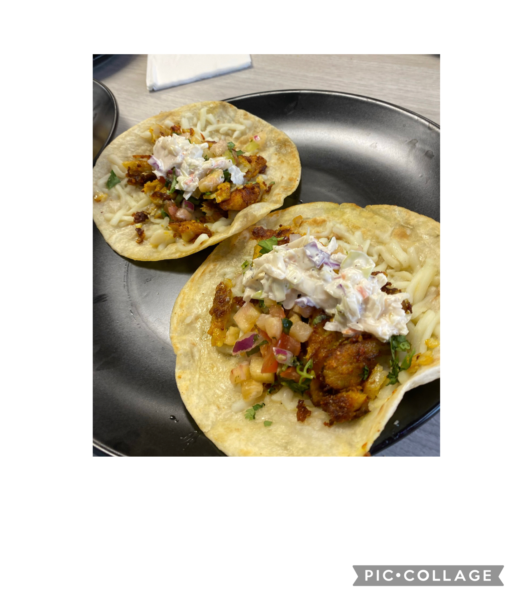 Fusion Fish Tacos fried with Lahori Spices topped with slaw and pinnapple salsa