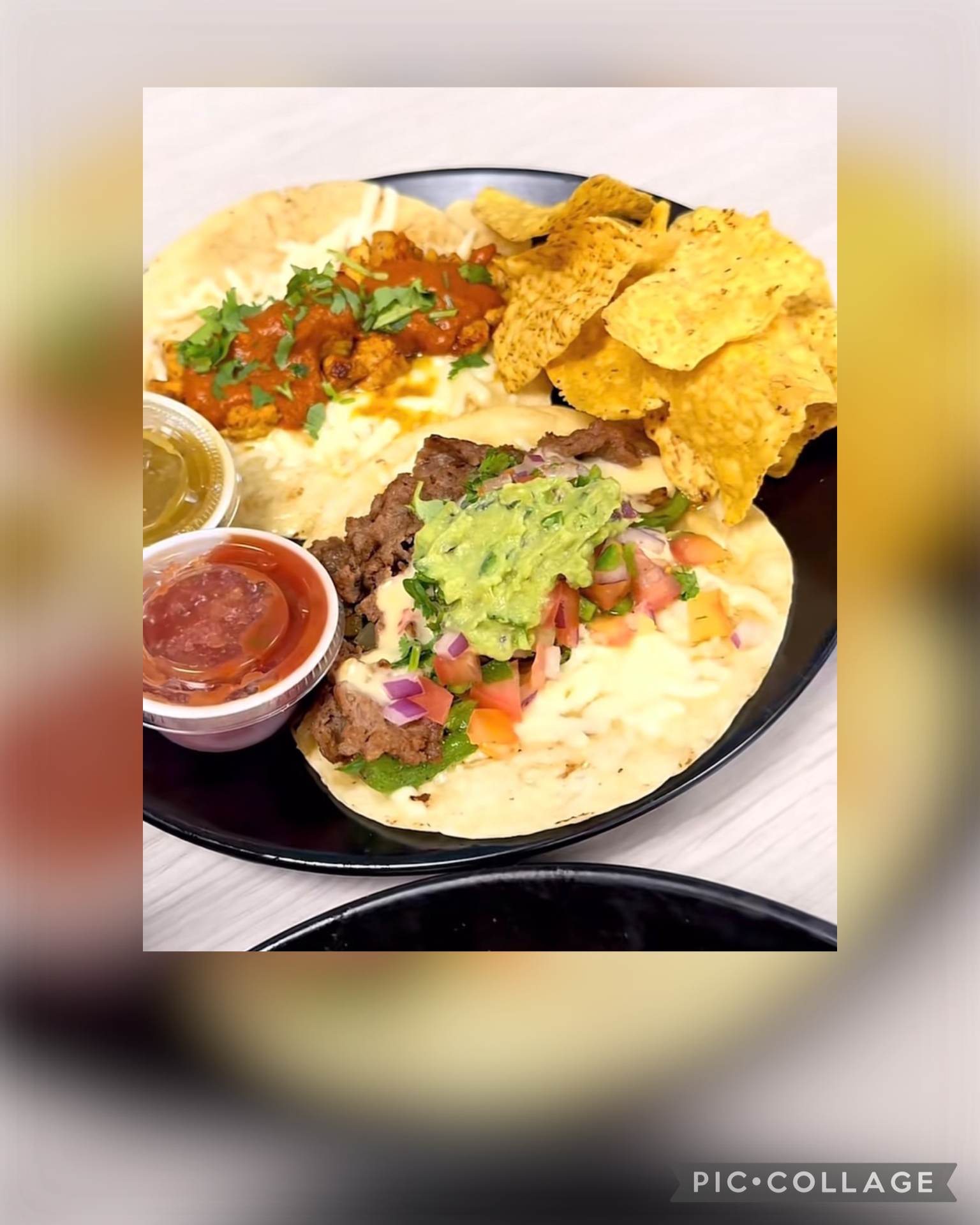 2 tacos plated for dine in customer with chips and salsa on the side