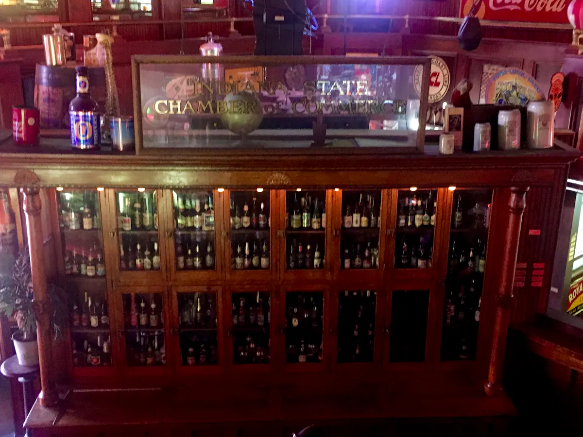 a shelf in a bar