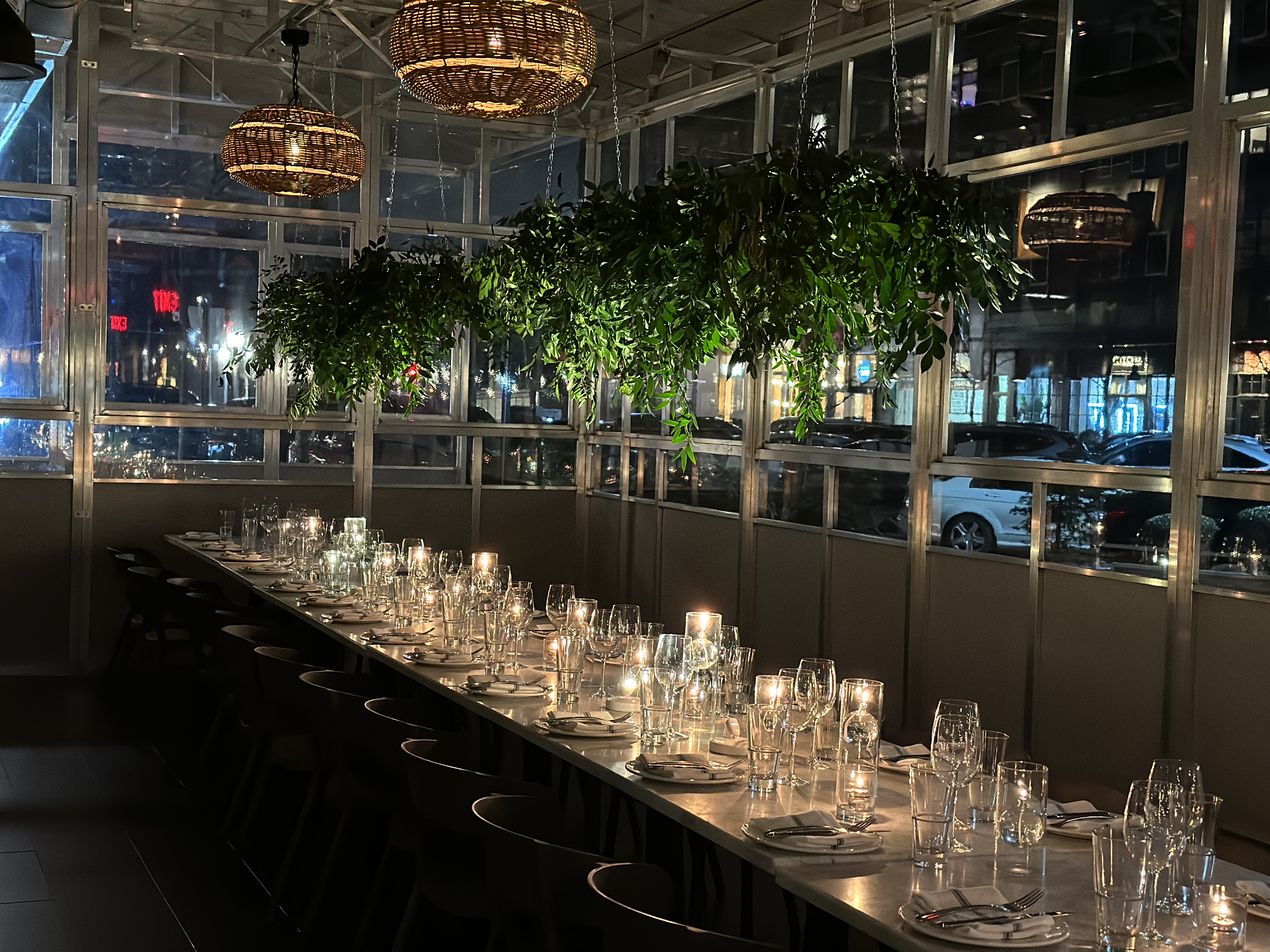 a row of wine glasses on a table