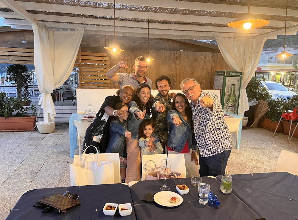 a group of people sitting at a table