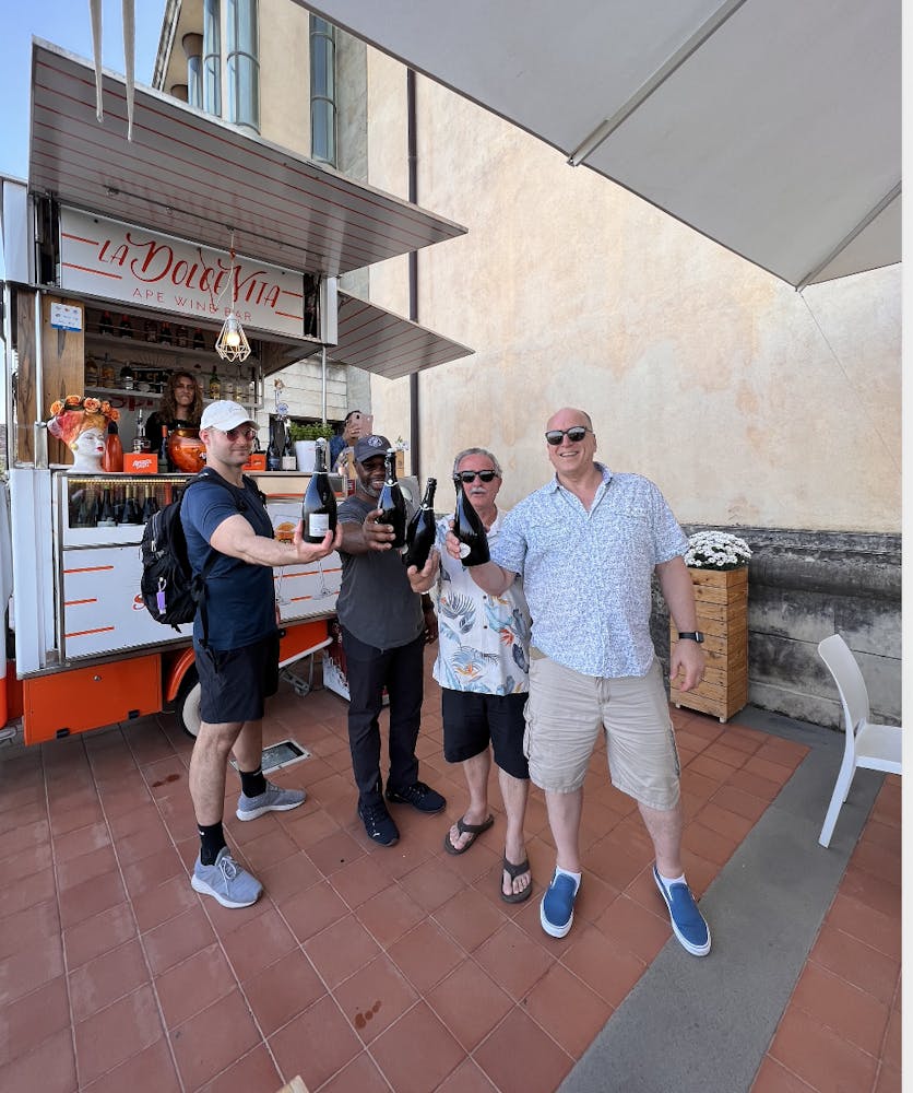 a group of people standing in front of a building