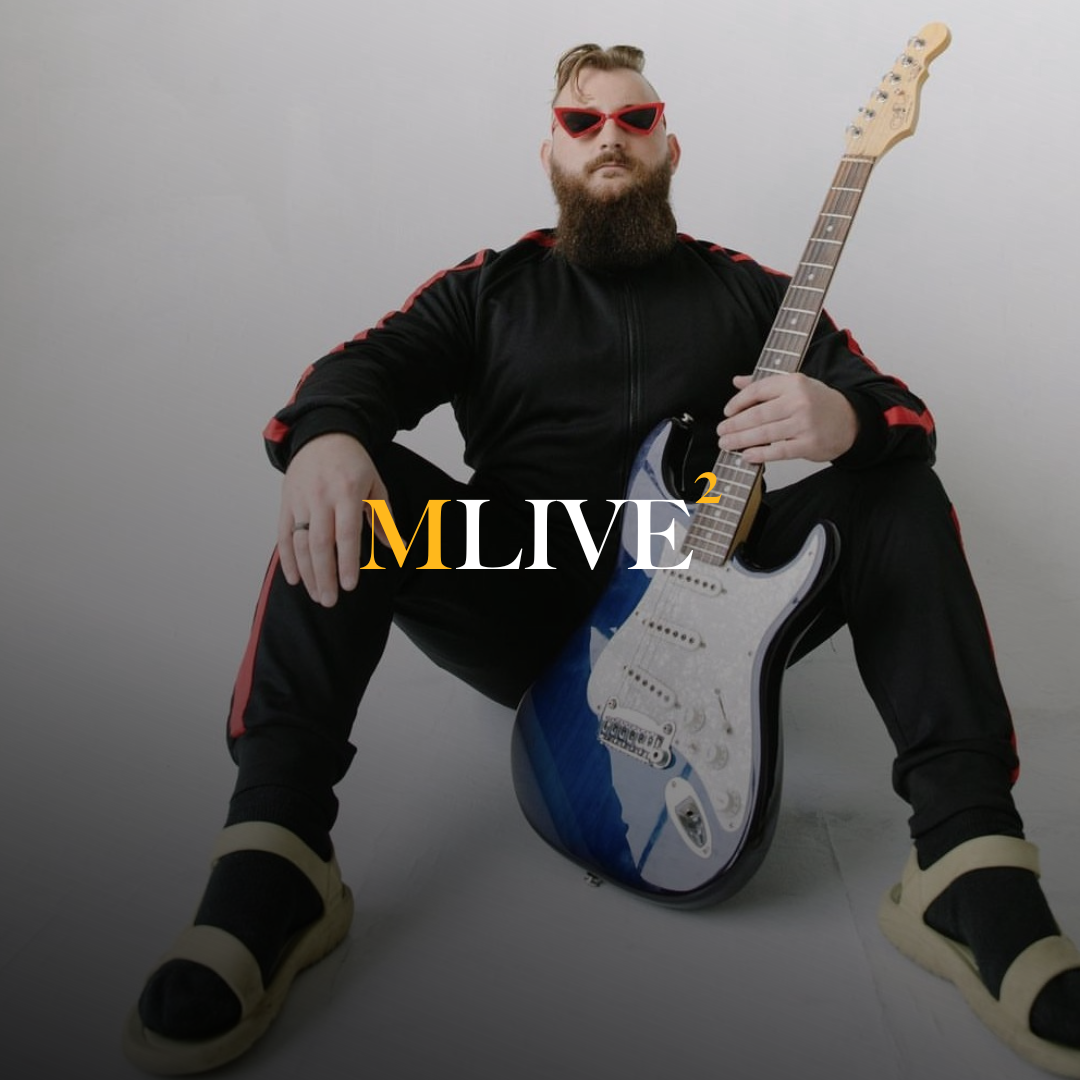 a man holding a snow board