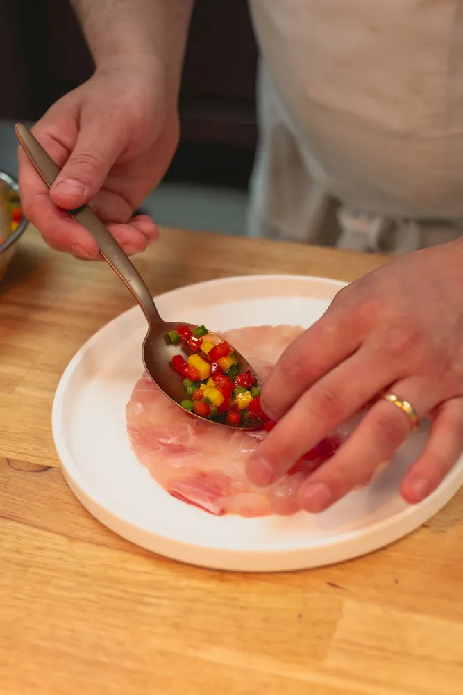 a man holding a plate of food