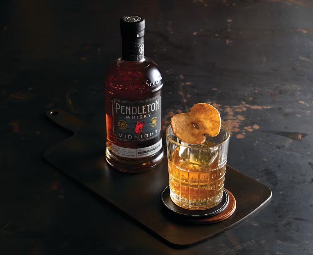 a bottle of beer on a table