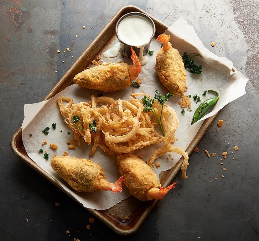 a plate of food with a knife