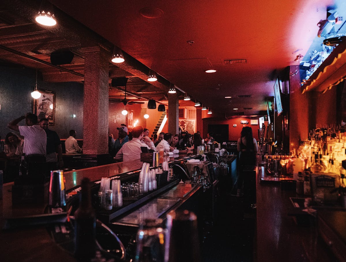 a group of people in a bar