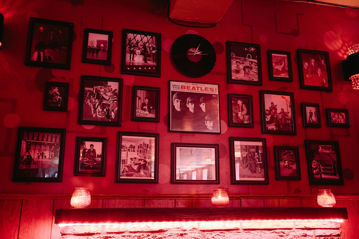 wall of framed pictures