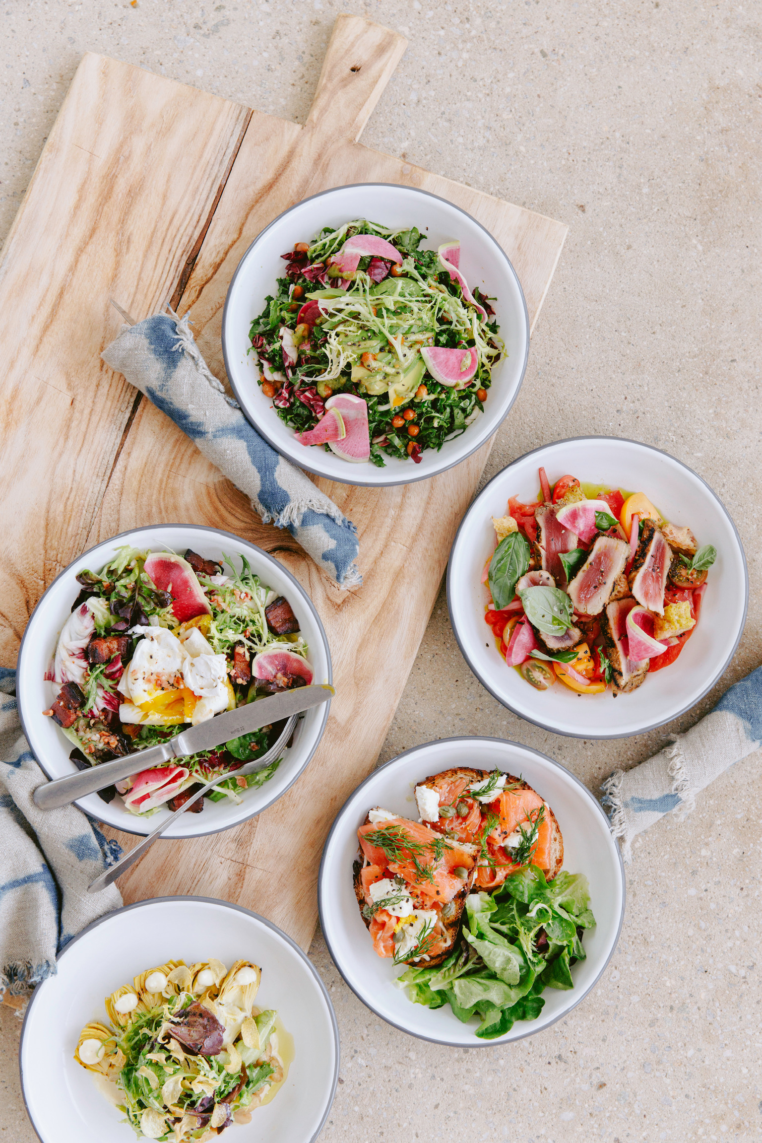 a bowl filled with different types of food on a plate