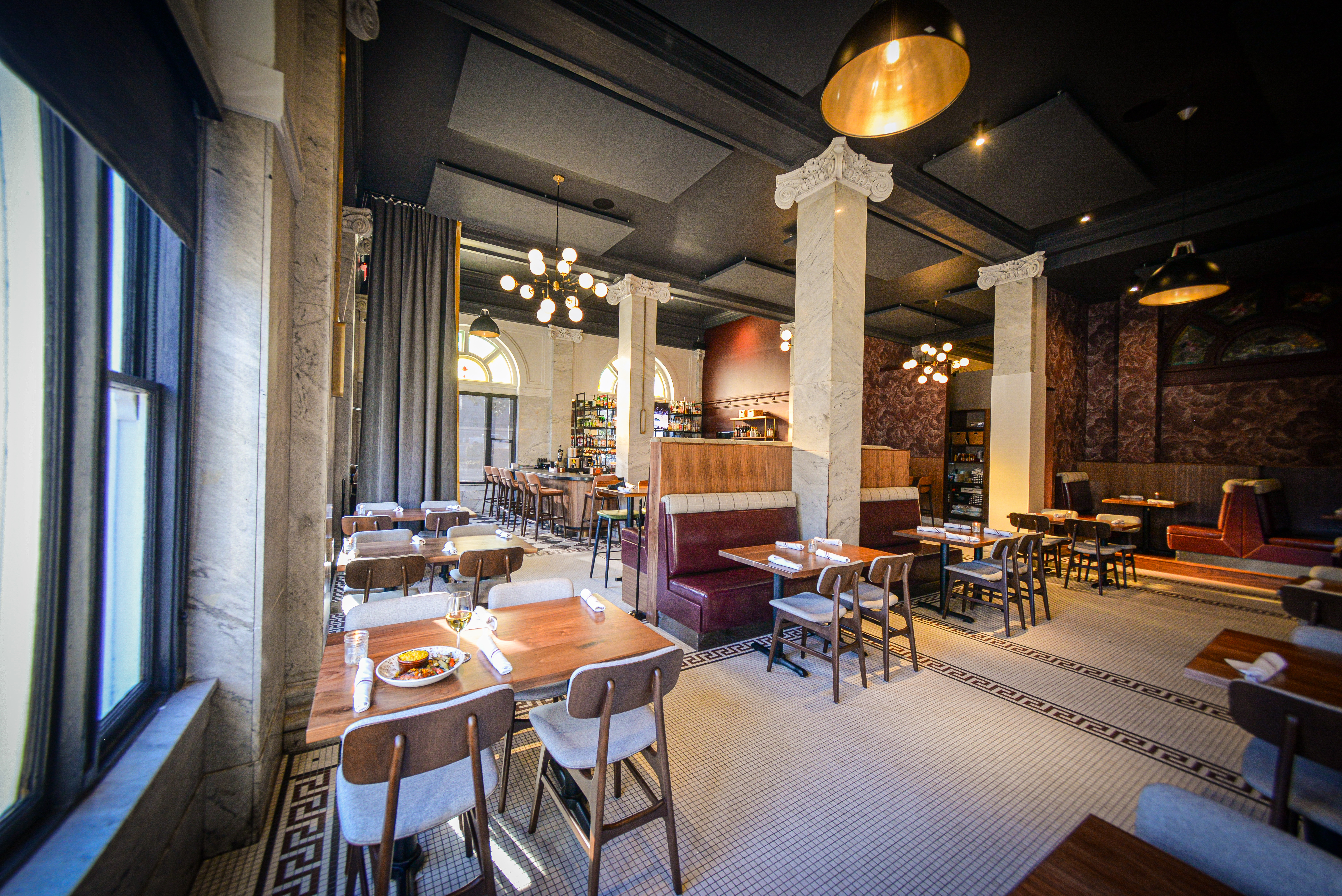 a restaurant with tables and chairs