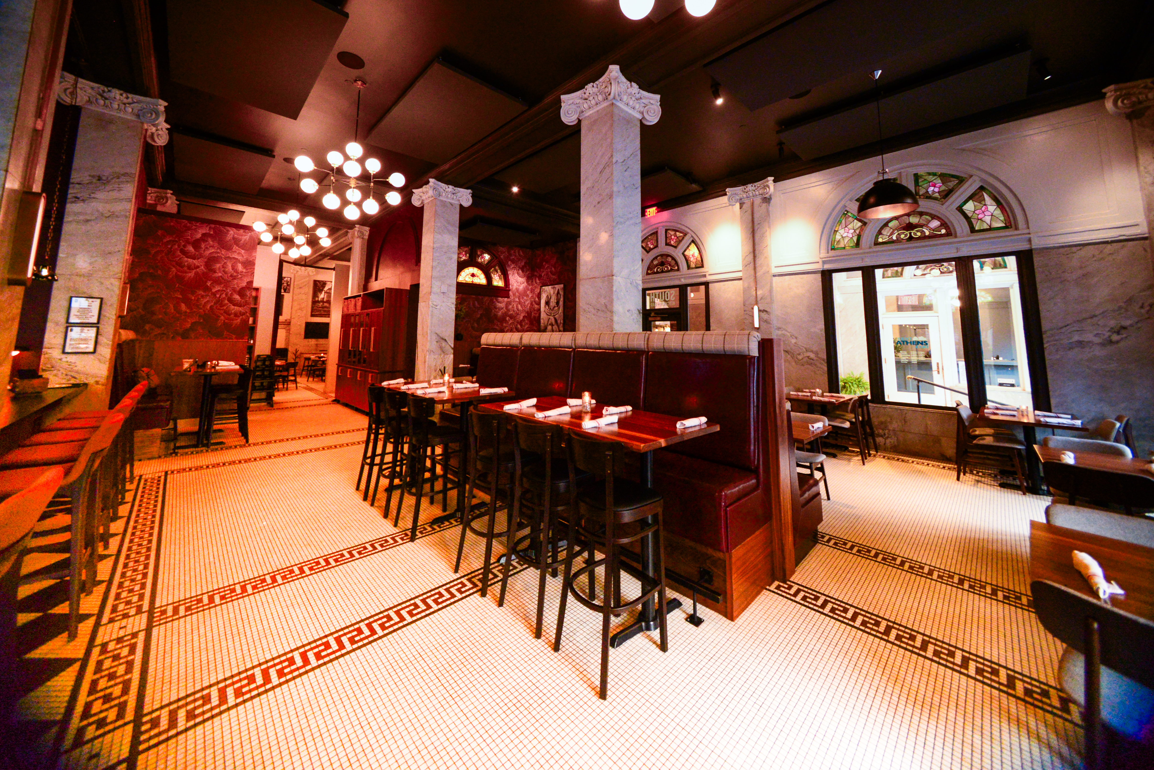 a restaurant with tables and chairs
