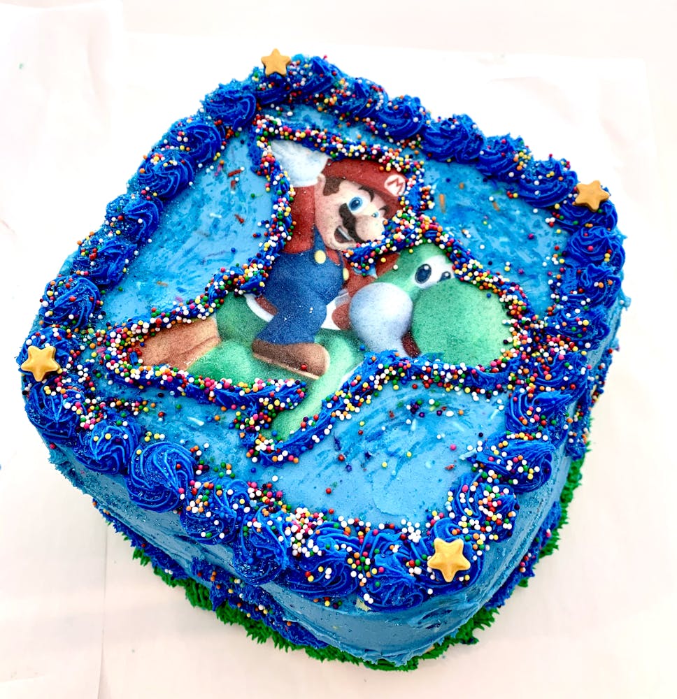 a blue and white cake on a table