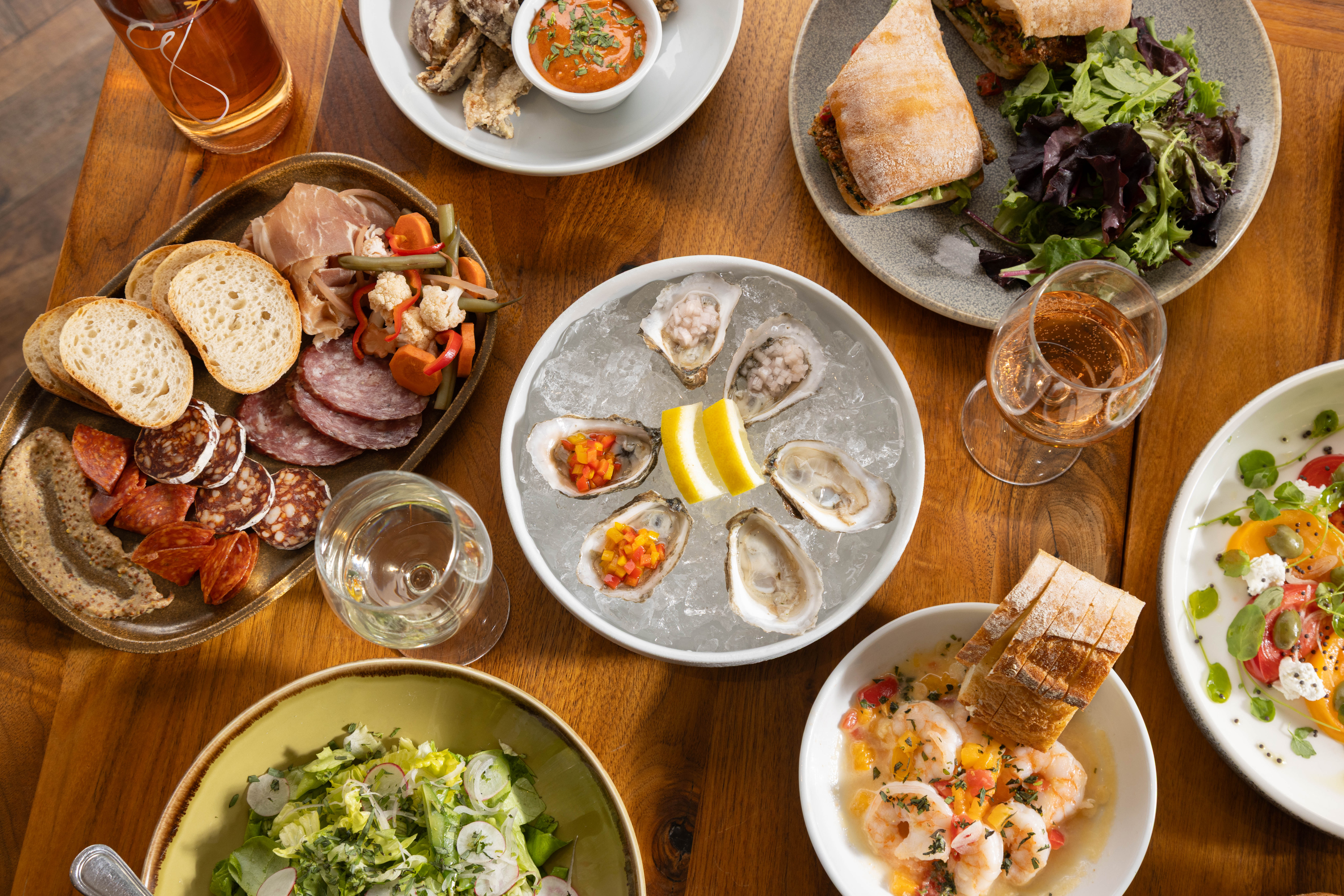 a bowl filled with different types of food on a wooden table