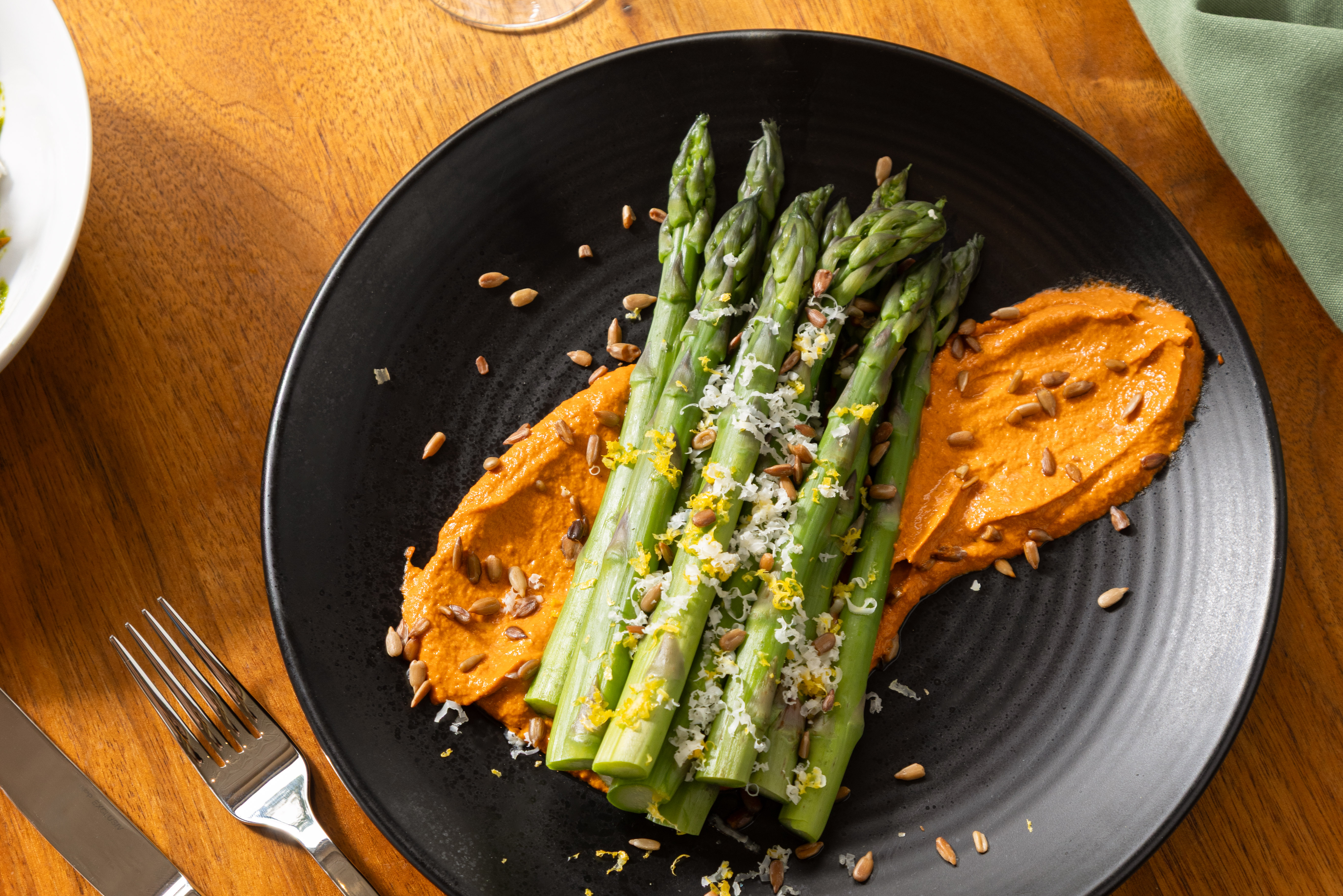 a plate of food sitting on top of a wooden table