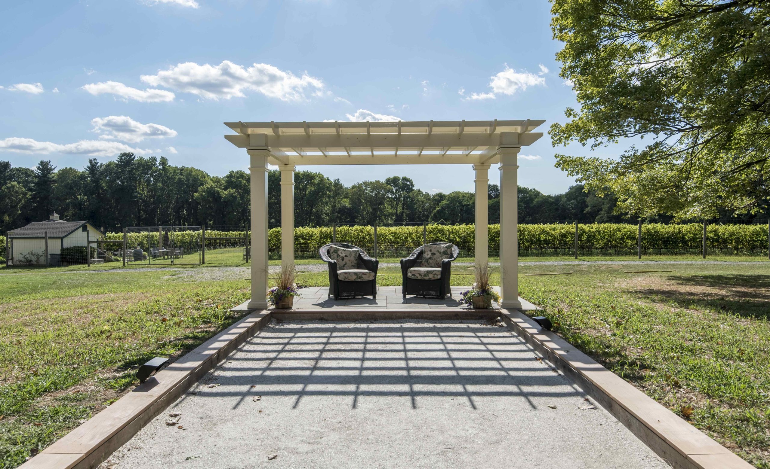a wooden statue in a park