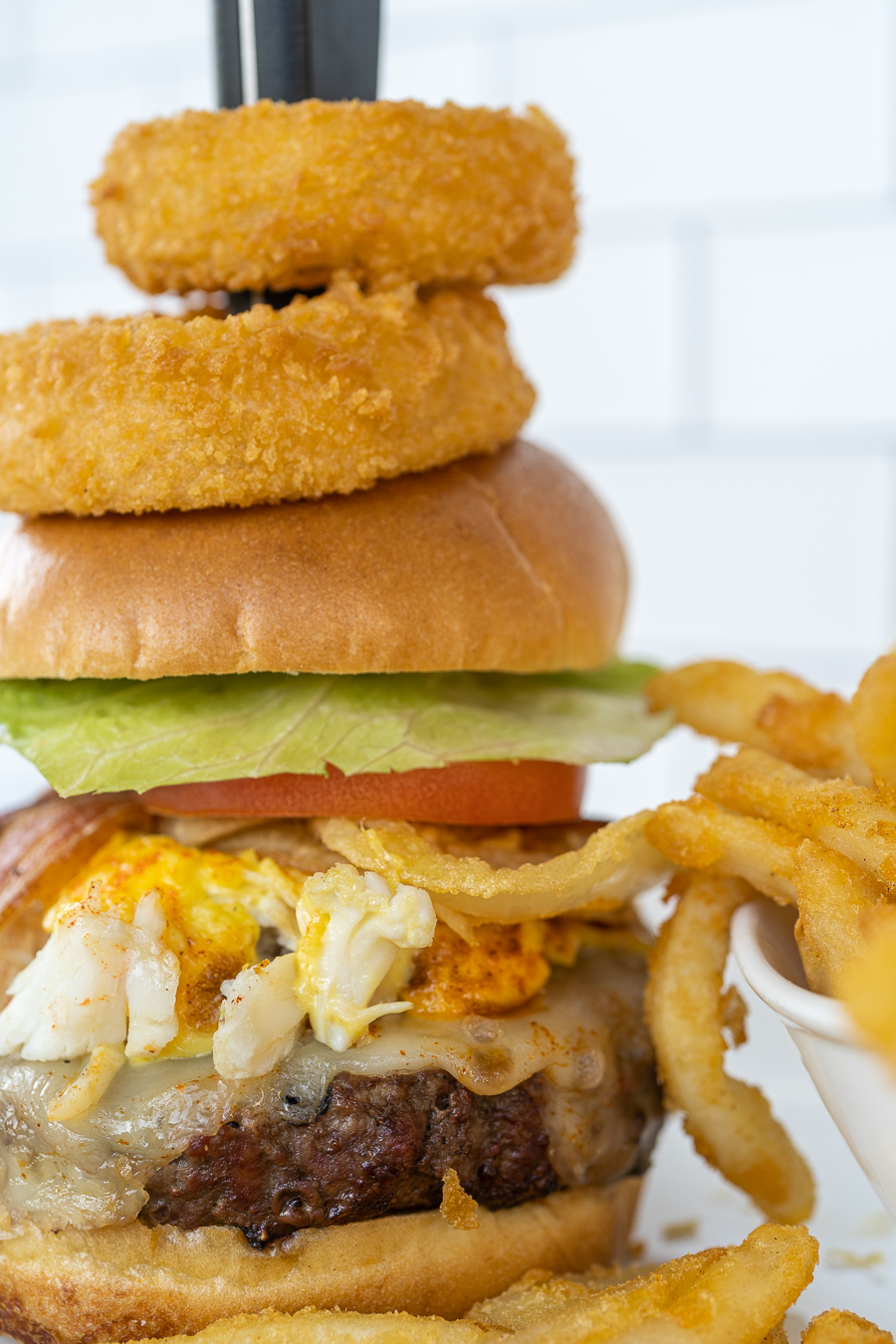 a close up of a sandwich and fries