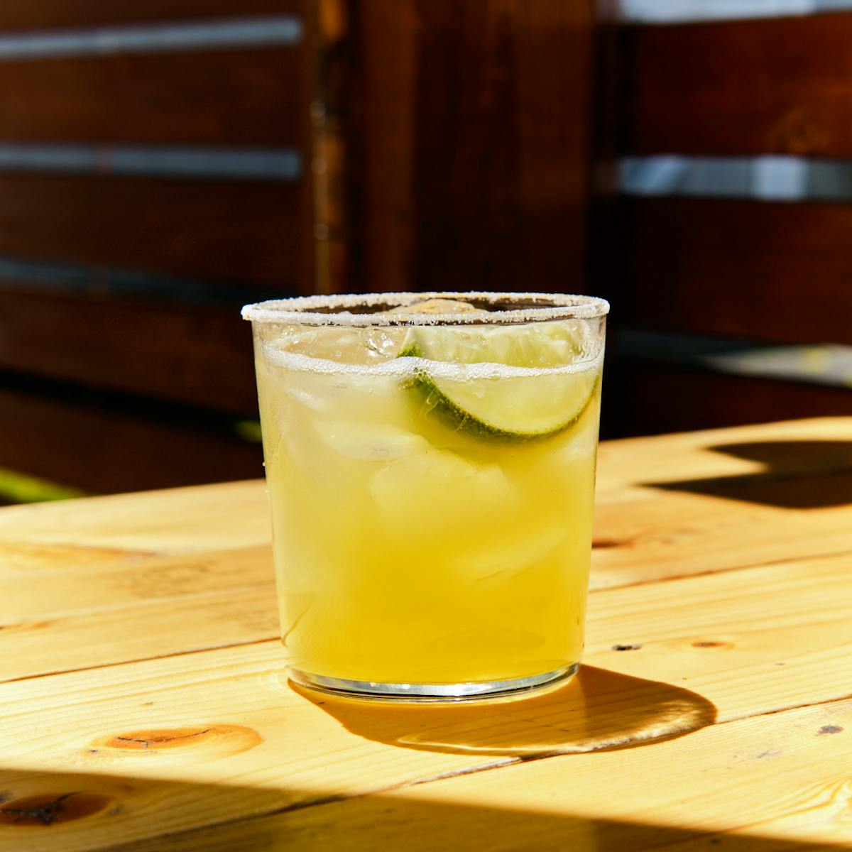 a drink on wooden table