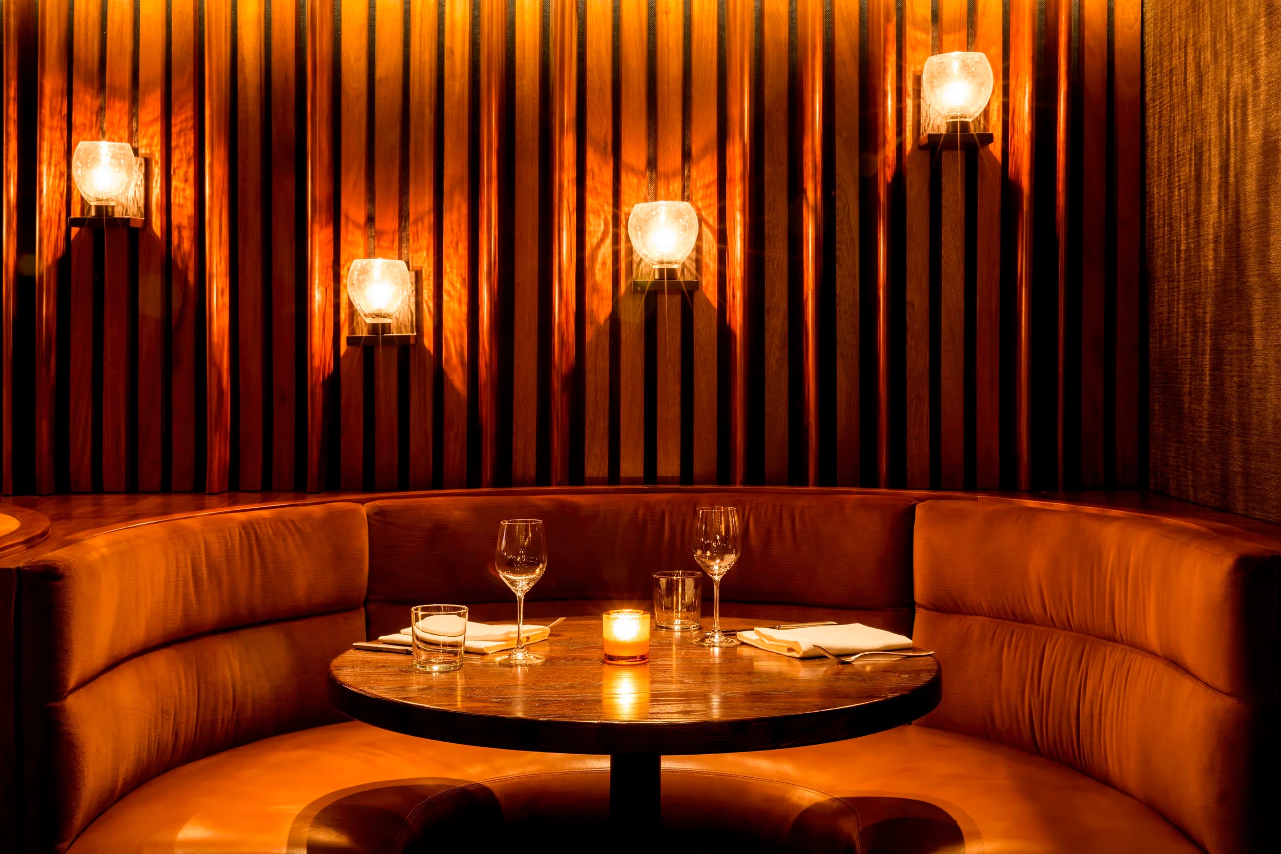 a room with a table and lights