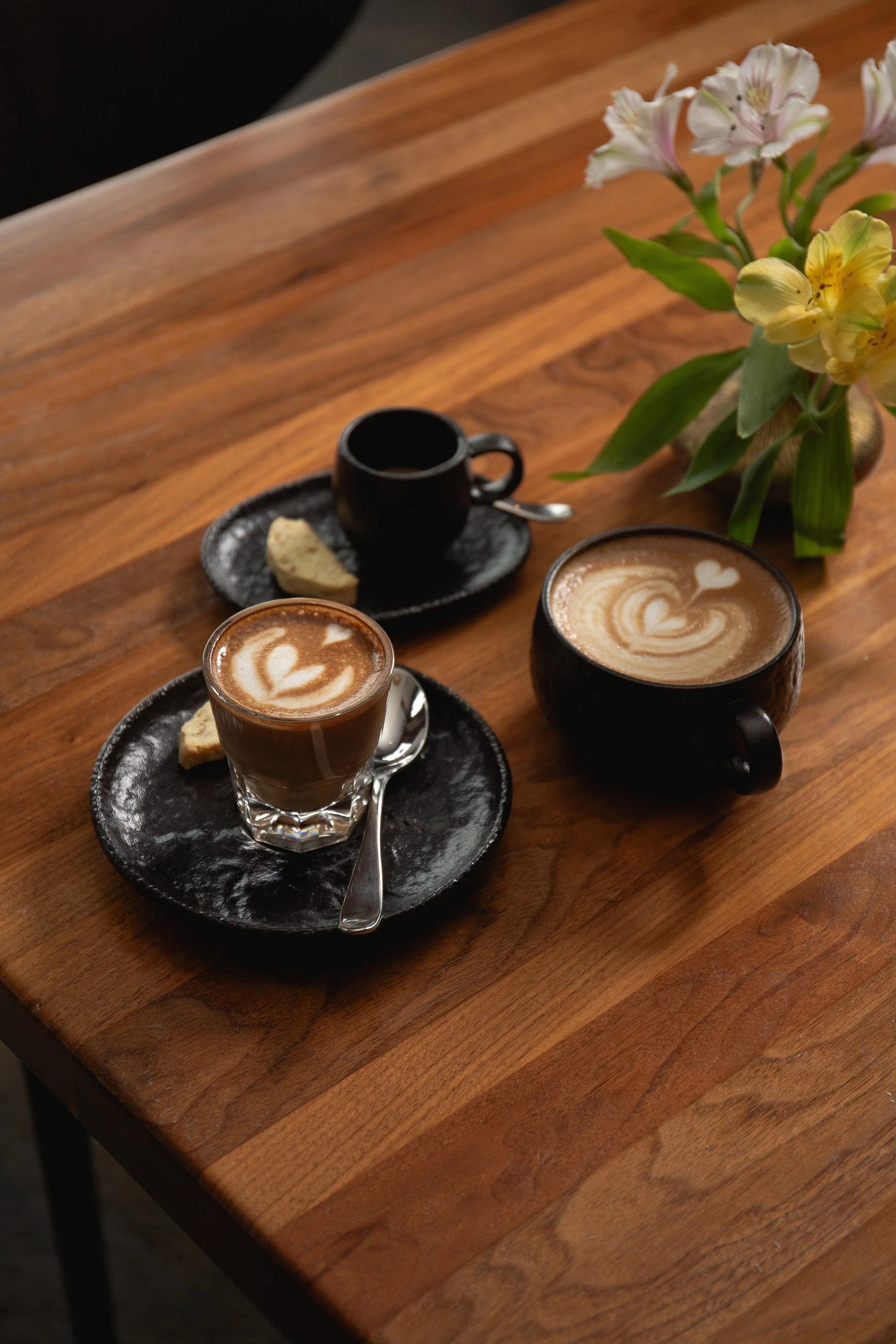 two cups of coffee on a table