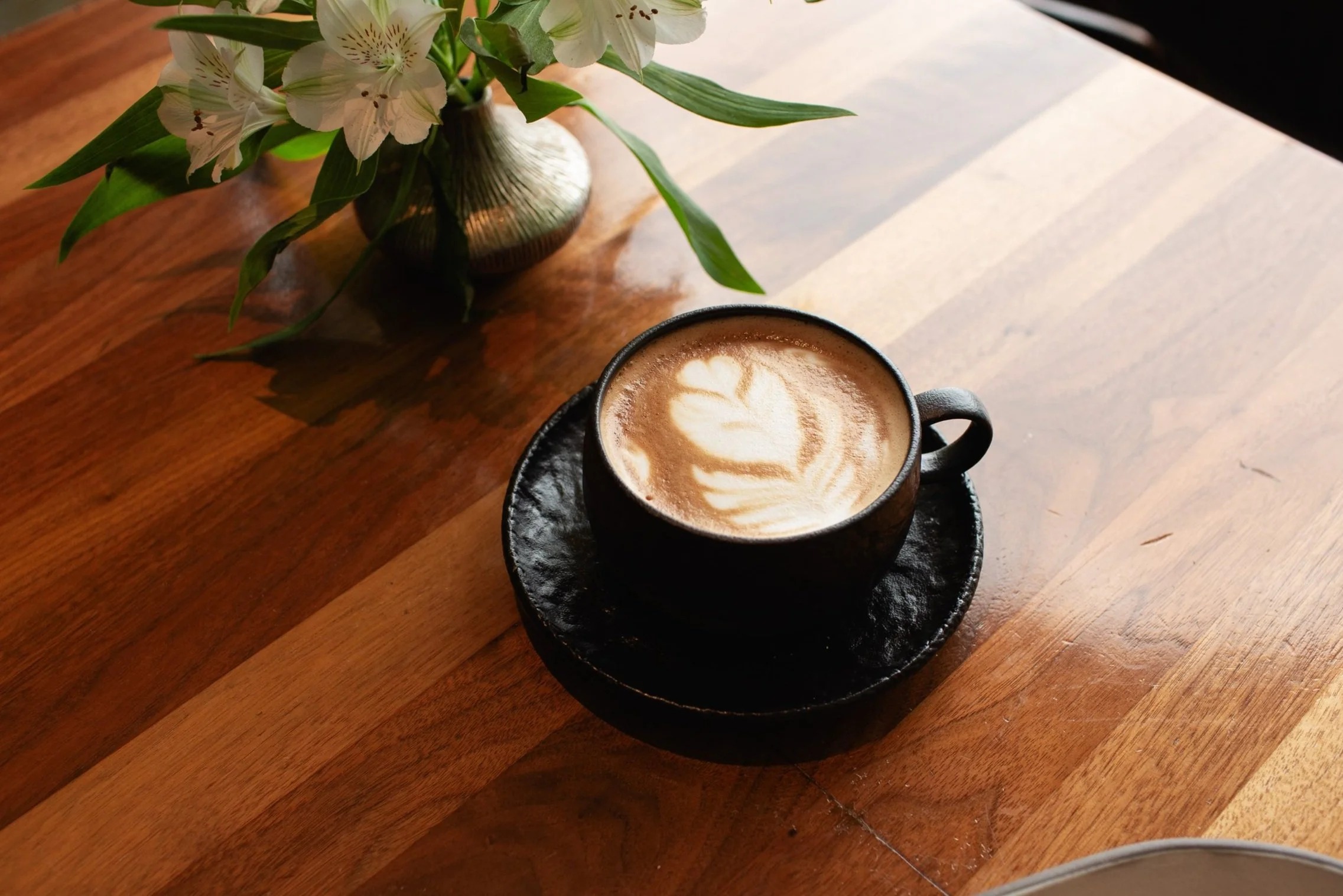 a cup of coffee on a table