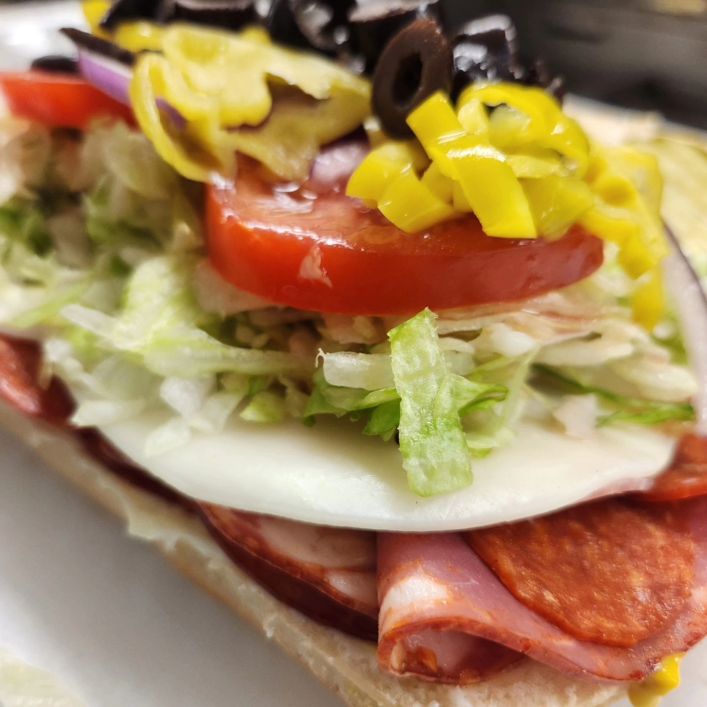 a close up of a hot dog on a bun