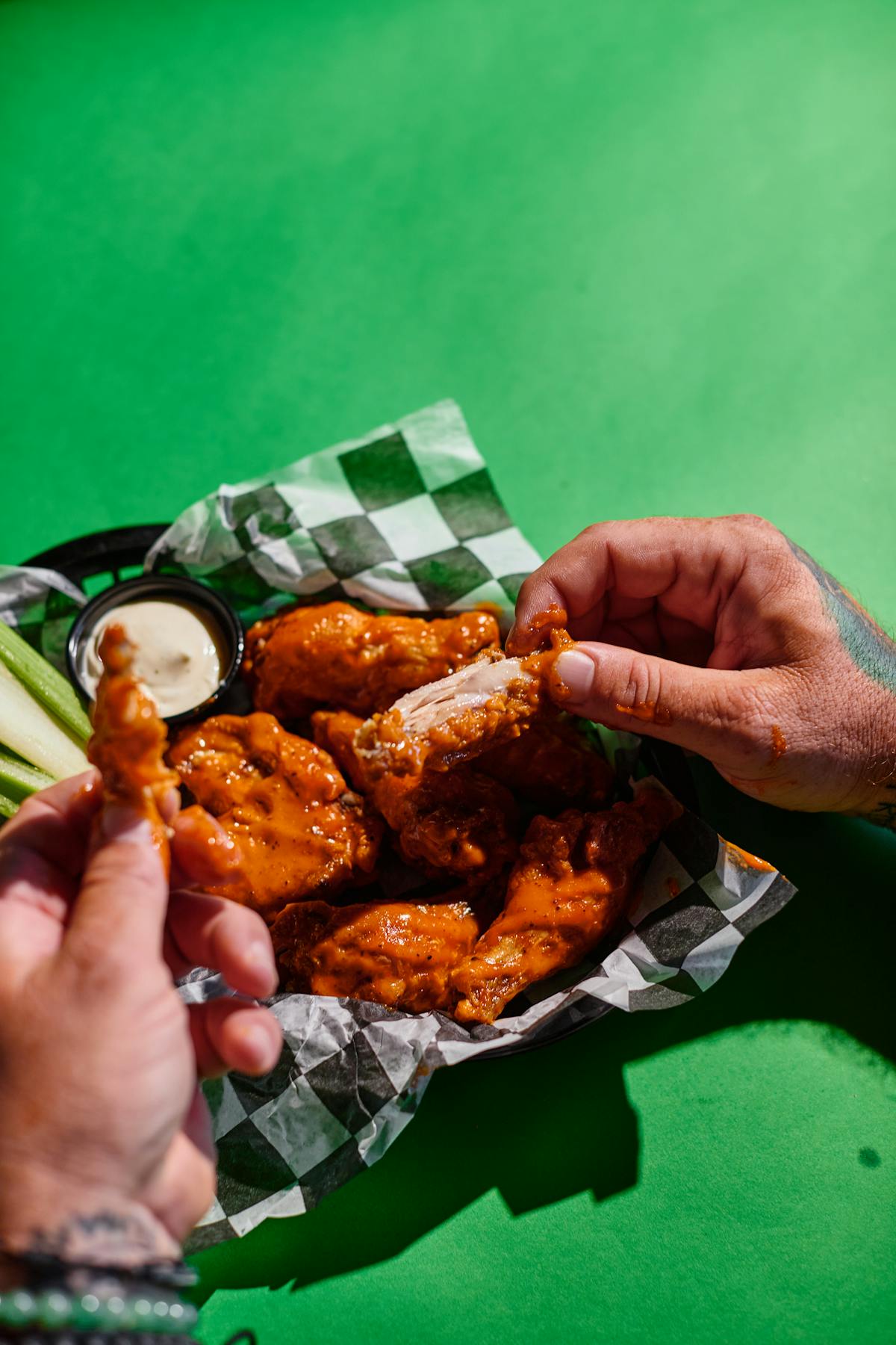 a hand holding a piece of food
