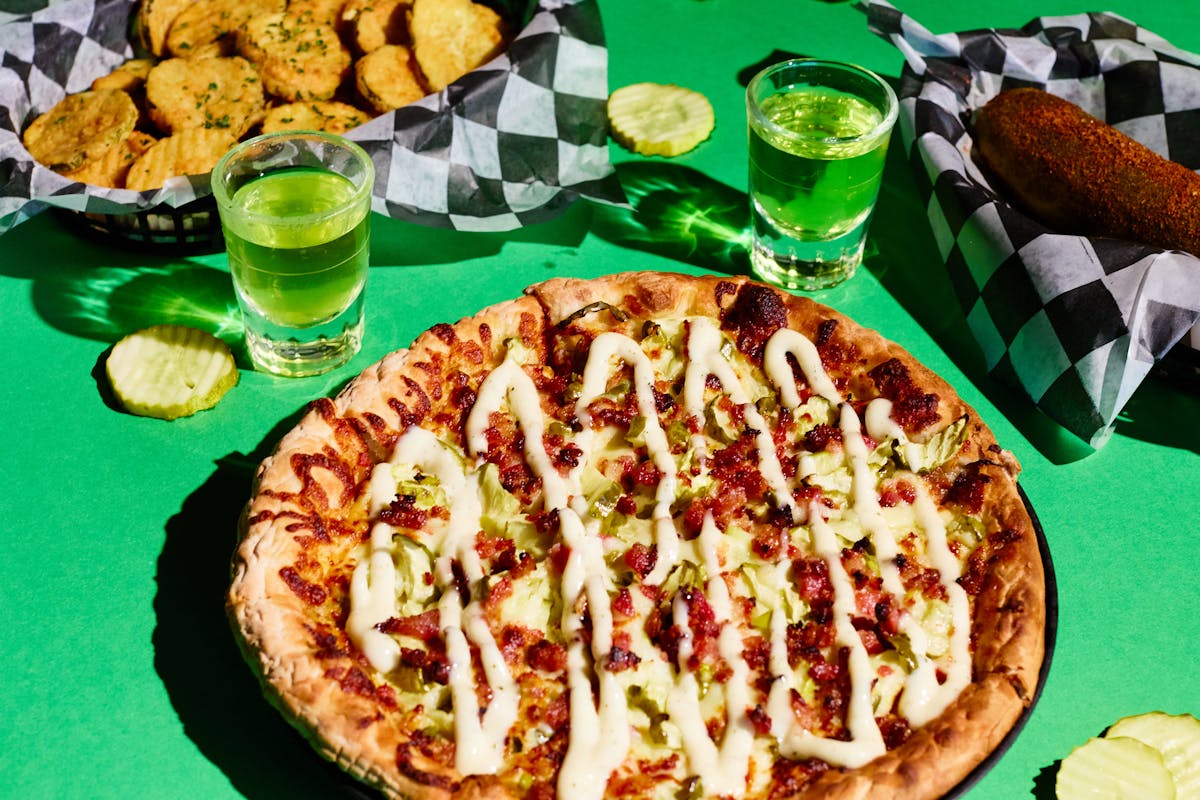 a pizza sitting on top of a table