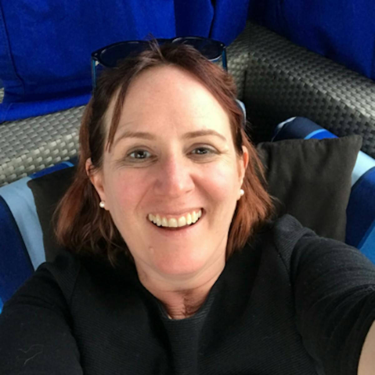 a woman smiling for the camera